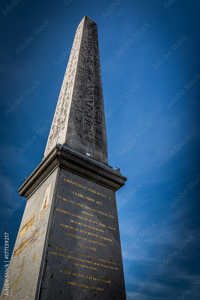 Egyptian Luxor obelisk with hieroglyphics. Place de la Concorde. Paris, France.