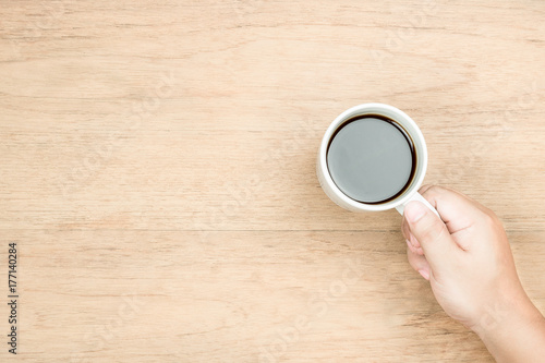 hand hold coffee cup