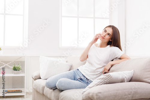 Girl at home talking on mobile