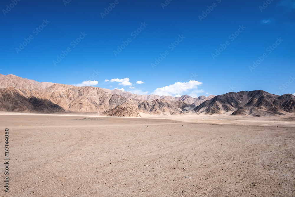 Landscape image of mountains and blue sky background in Ladakh , India