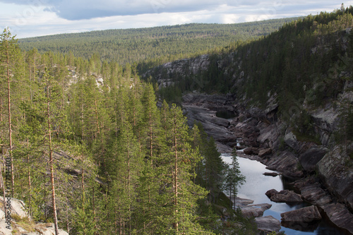 Rock canyon near by Porjus, Sweden, summer  photo