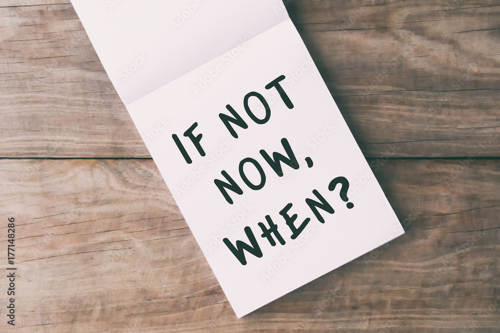 Inspirational quotes - if not now, when? on notepad on top of wooden table. Inspirational quotes - if not now, when? on notepad on top of wooden table.