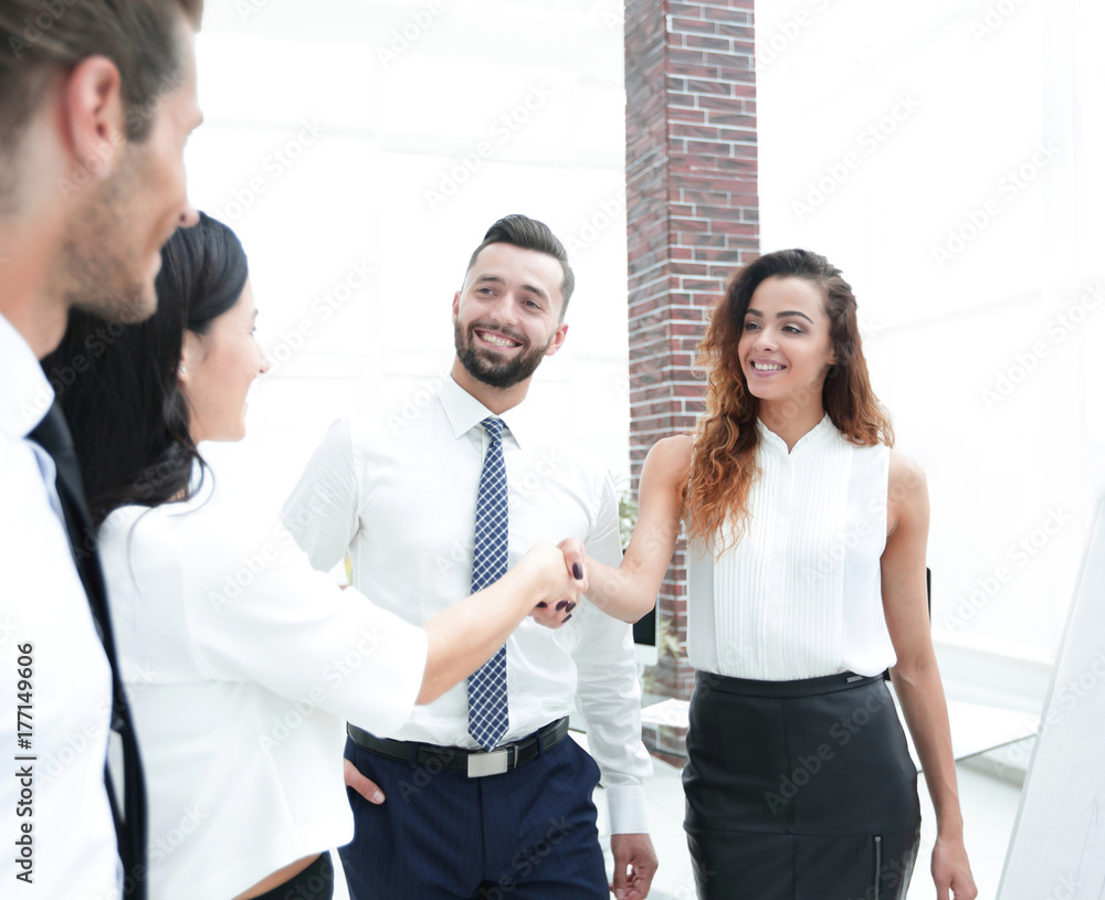 business women greet each other with a handshake business women greet each other with a handshake