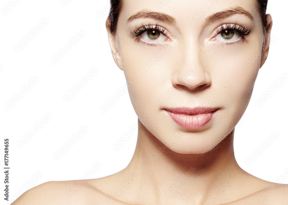 Beautiful face of young woman. Skincare, wellness, spa. Clean soft skin, healthy fresh look. Natural daily makeup