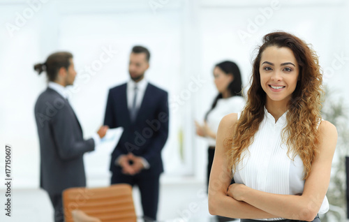 beautiful woman on the background of business people.