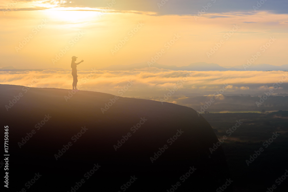 Morning sunrise and foggy of the rock whale mountain in Thailand
