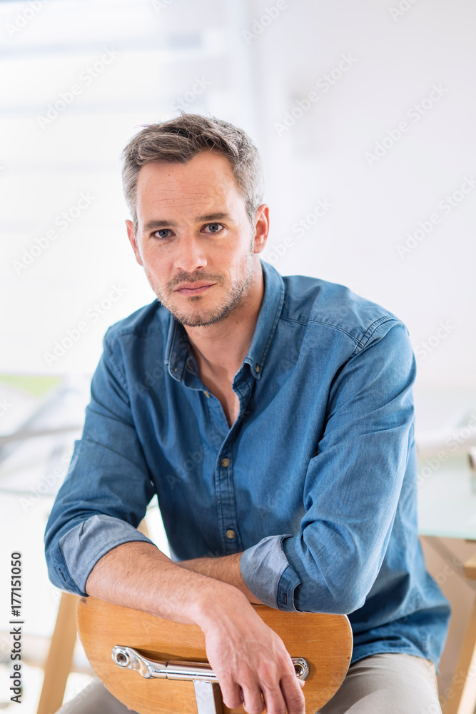 Portrait of a handsome man with gray hair