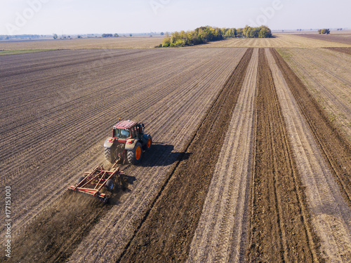 Tractor preparing soil