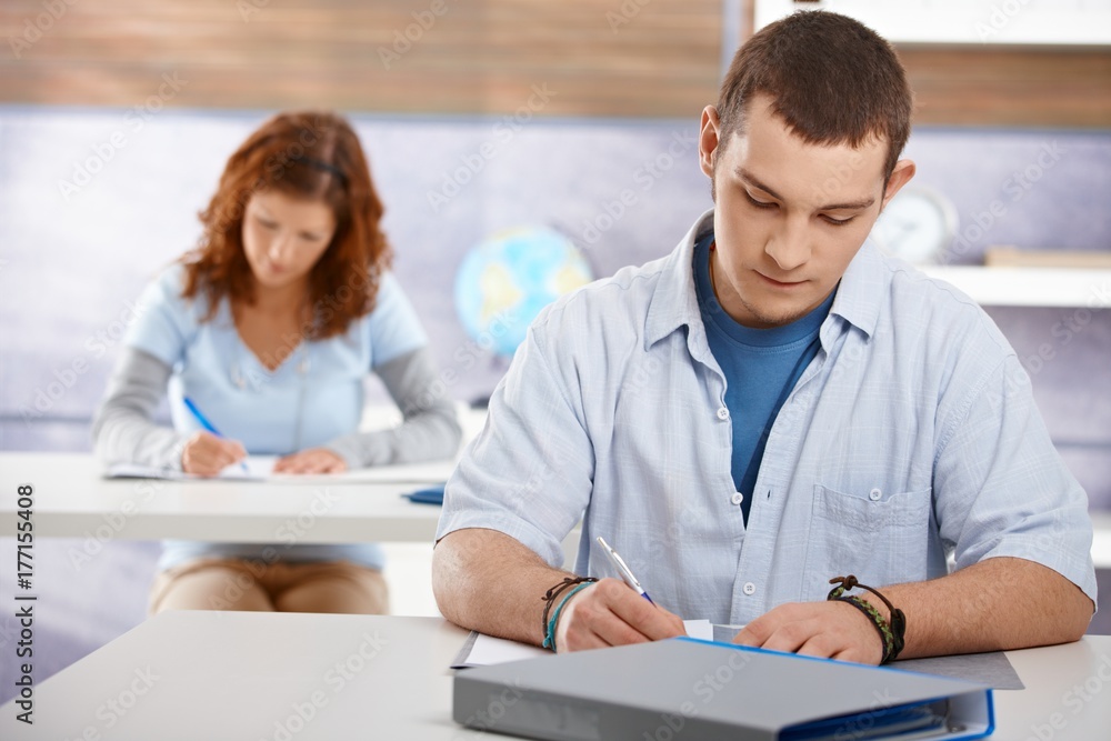 Students studying in classroom Students studying in classroom