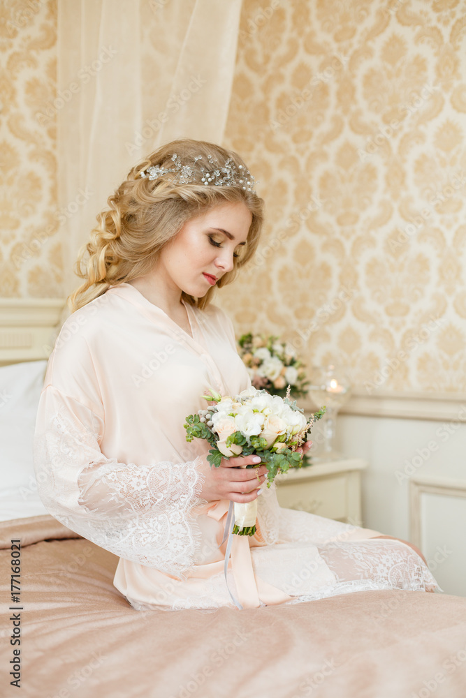 Beautiful young Bride with blonde hairs in a bedroom. Classic white wedding dress. Half-length portrait Beautiful young Bride with blonde hairs in a bedroom. Classic white wedding dress. Half-length portrait