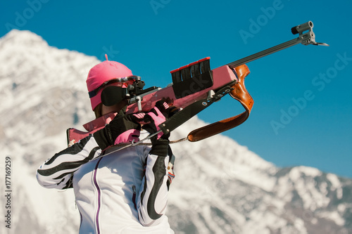 Young Biathlon Competitor at Target Shooting photo