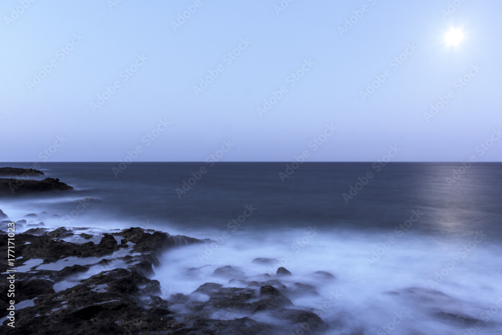 Moon over the ocean - Lanzarote, Canary Islands, Spain Moon over the ocean - Lanzarote, Canary Islands, Spain