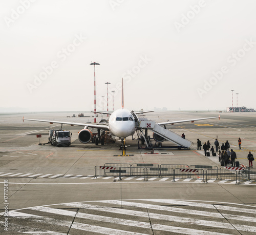 People boarding on the plane