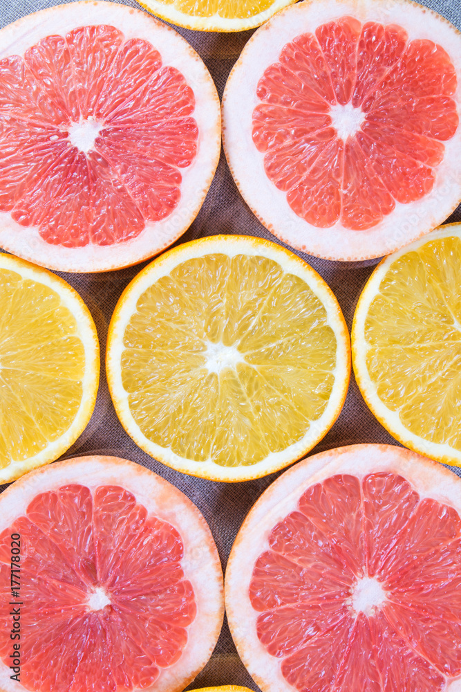 Close up of sliced grapefruit and lemon as a background Close up of sliced grapefruit and lemon as a background