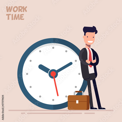 Happy businessman or manager is standing near a big clock. Vector illustration in a flat style. Concept of time management.