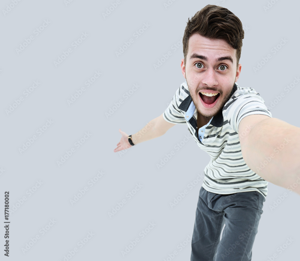 Portrait of a joyful casual man making selfie Portrait of a joyful casual man making selfie