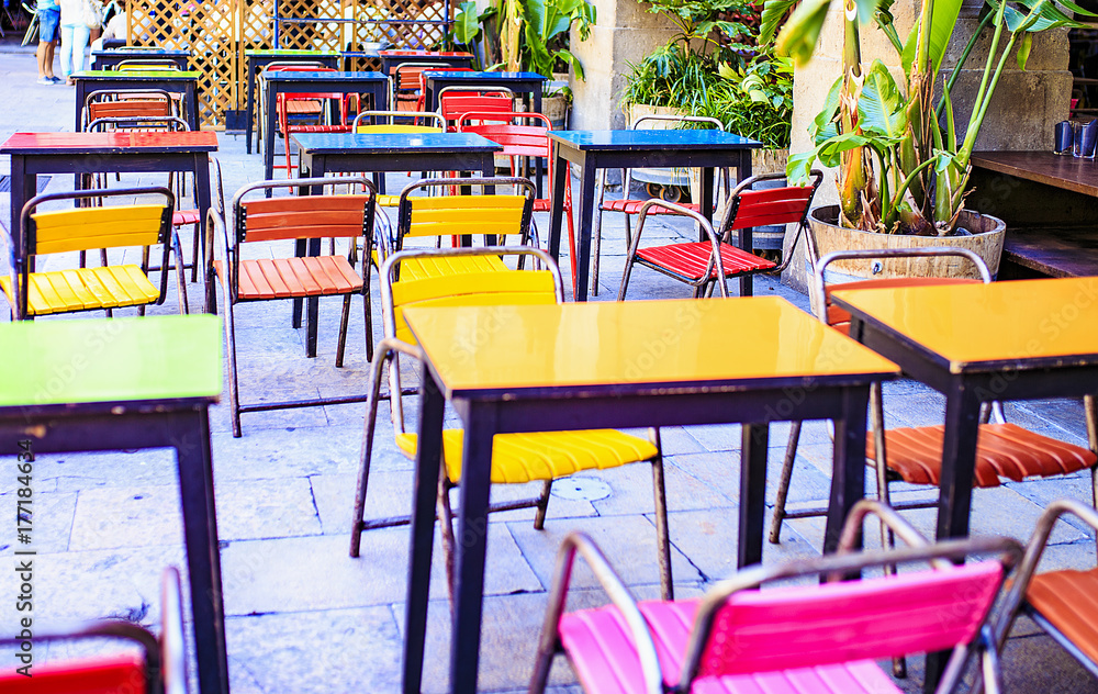 Tables of different colors in Barcelona