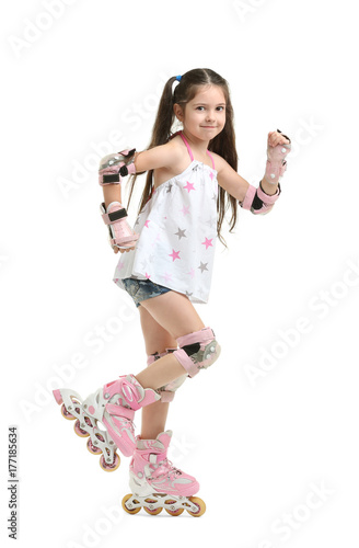 Cute girl on roller skates ...
