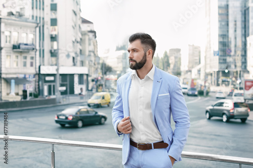 Handsome successful businessman outdoors