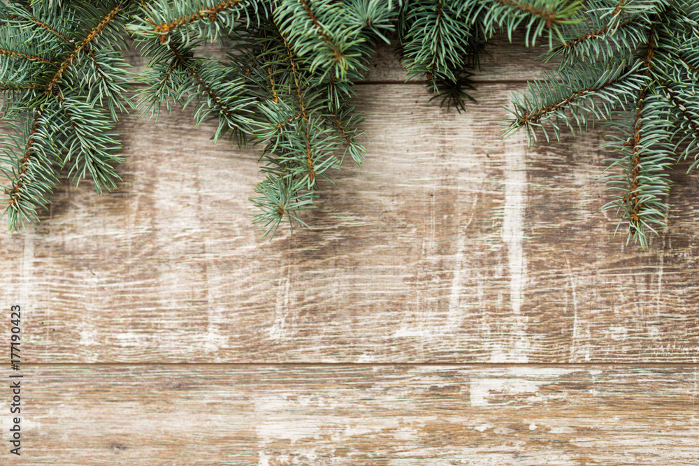 Fir tree branches and Christmas decorations are on the boards. Christmas background. Christmas Socks. New Year background. Xmax background. Christmas tree. Fir tree branches and Christmas decorations are on the boards. Christmas background. Christmas Socks. New Year background. Xmax background. Christmas tree.