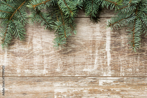 Fir tree branches and Christmas decorations are on the boards. Christmas background. Christmas Socks. New Year background. Xmax background. Christmas tree.