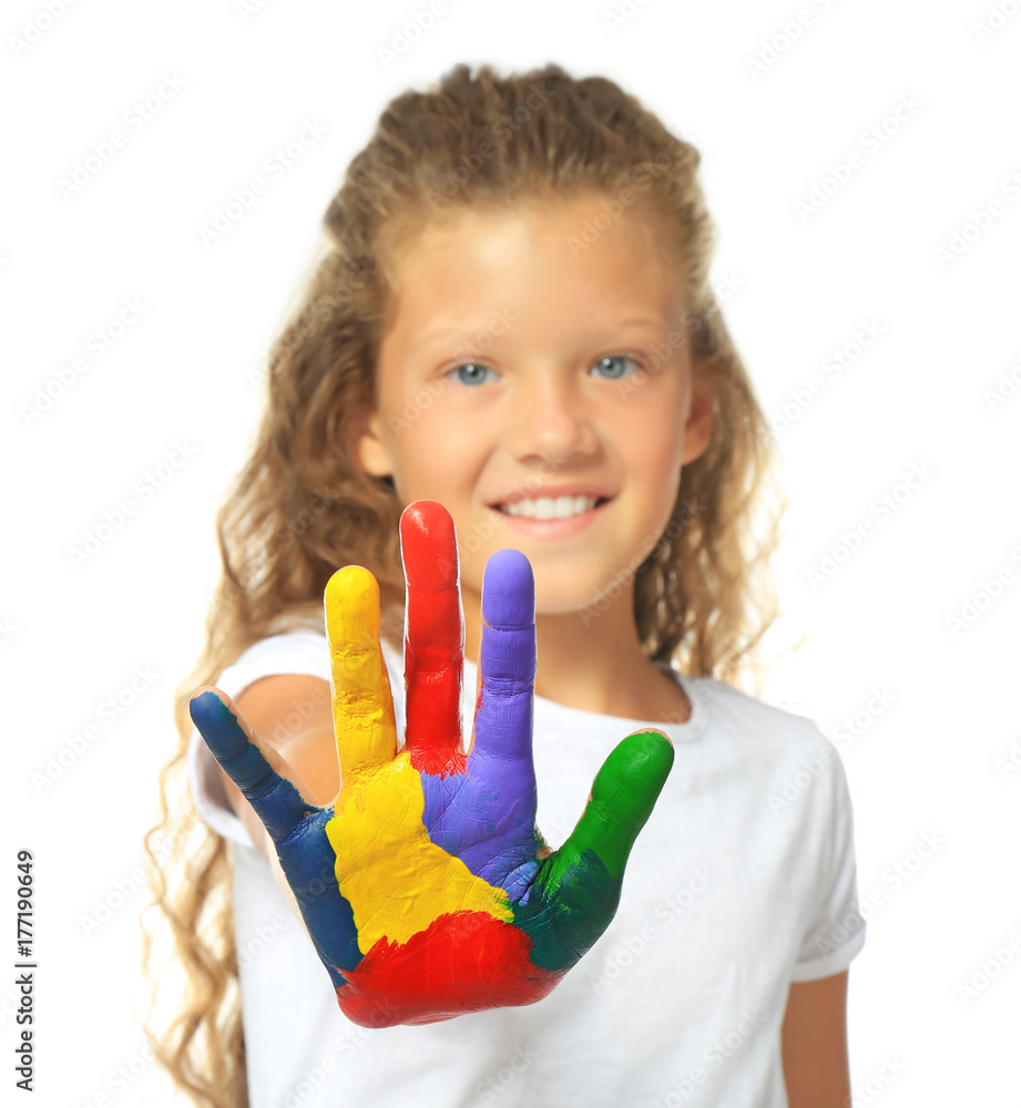 Little cute girl showing painted hand on white background Little cute girl showing painted hand on white background