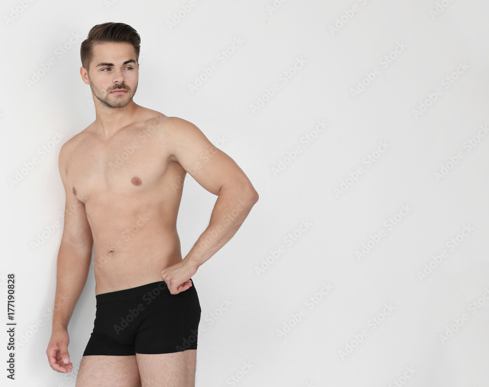 Sexy man in underwear on white background Sexy man in underwear on white background