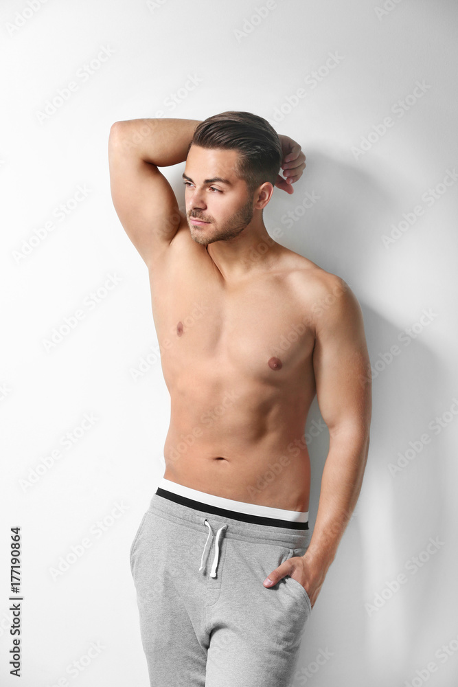 Sexy shirtless man on white background Sexy shirtless man on white background