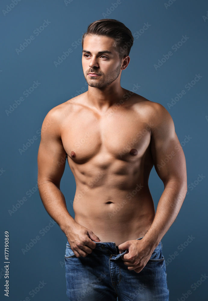 Sexy shirtless man on color background