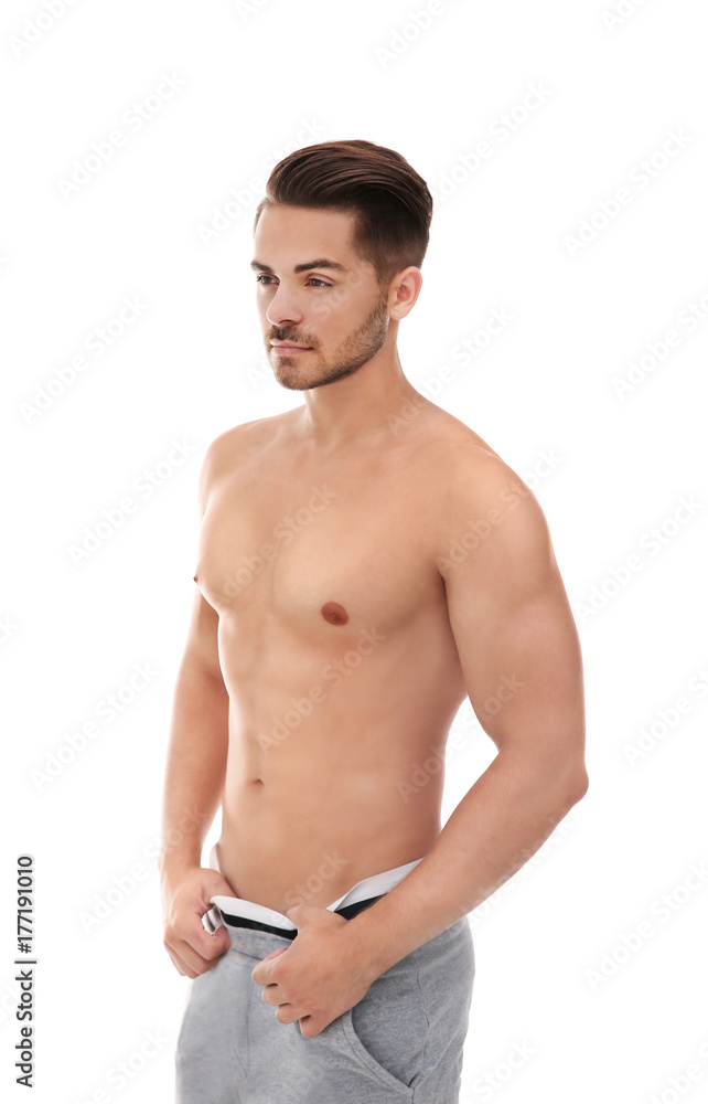 Sexy shirtless man on white background