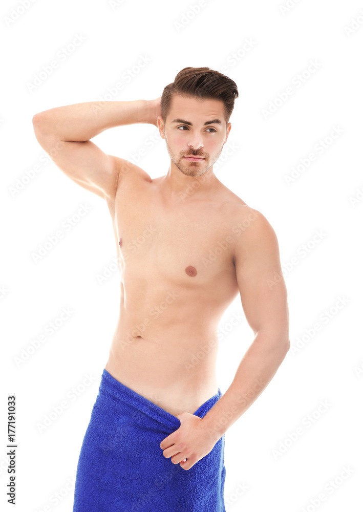 Sexy man wrapped in towel on white background Sexy man wrapped in towel on white background