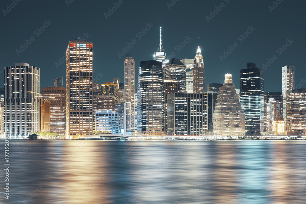 New York City skyline seen from Brooklyn at night, color toning applied, USA. - obrazy, fototapety, plakaty 