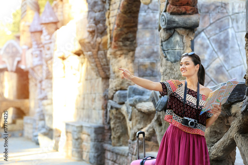 Beautiful young tourist wit...