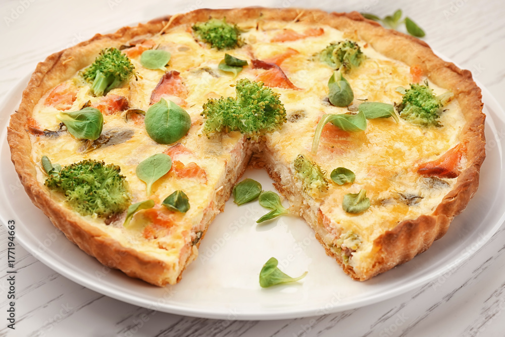 Tasty salmon quiche on plate Tasty salmon quiche on plate