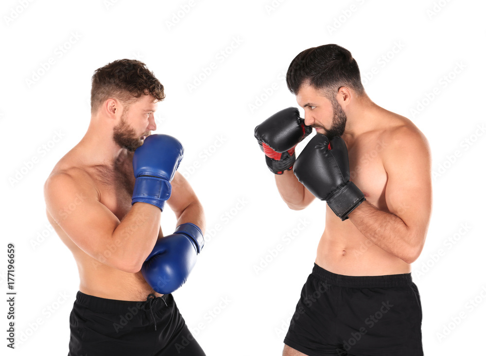 Male boxers fighting on white background