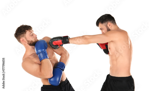 Male boxers fighting on white background © Africa Studio