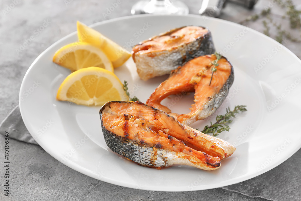 Grilled salmon steaks on plate Grilled salmon steaks on plate