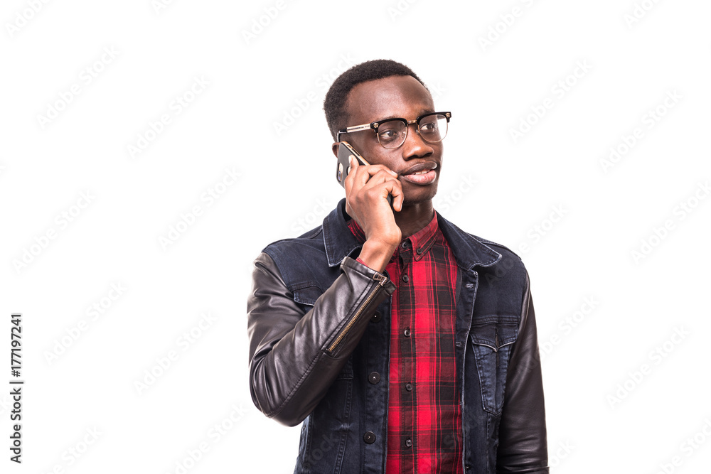 Young African American man making a phone call on her smartphone on white Young African American man making a phone call on her smartphone on white