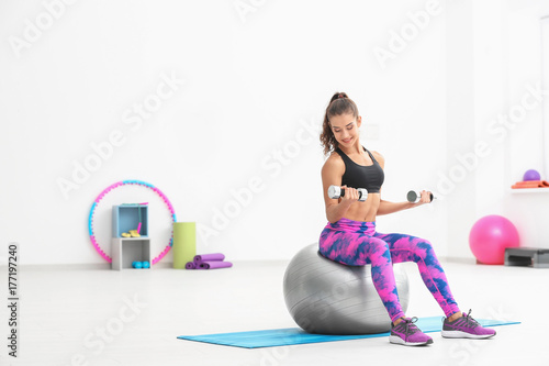 Young sporty woman training...