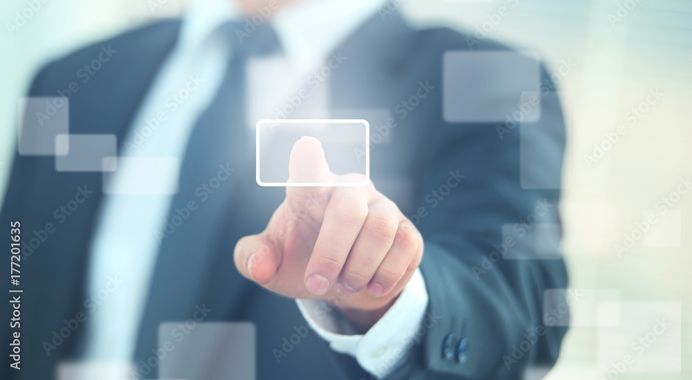 business man pressing a touchscreen button business man pressing a touchscreen button