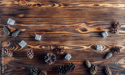 pine cones on a brown woody background
