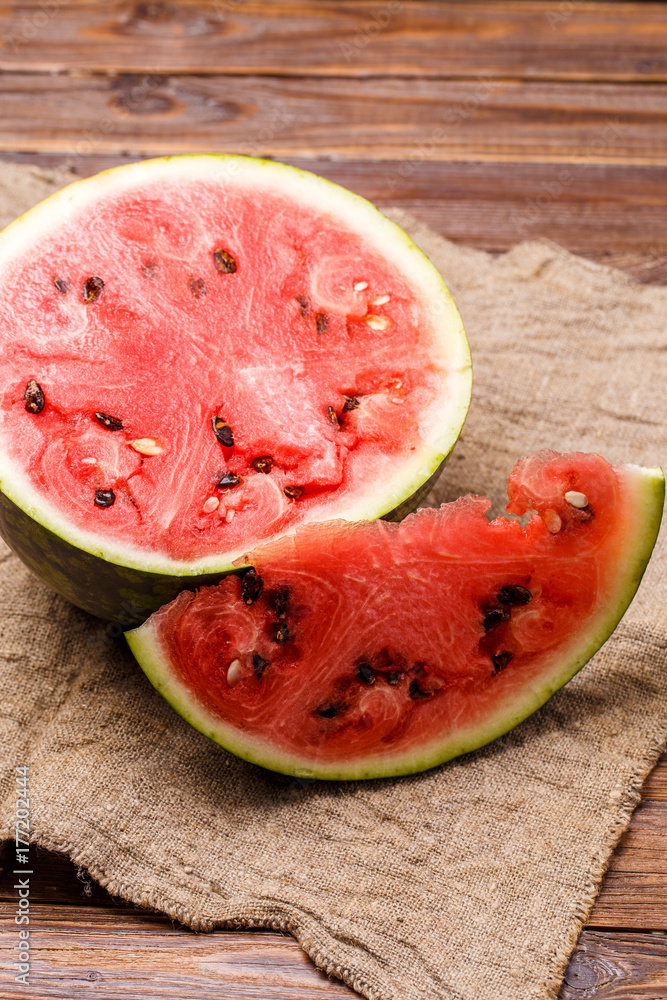 Image of cut watermelon on cloth Image of cut watermelon on cloth