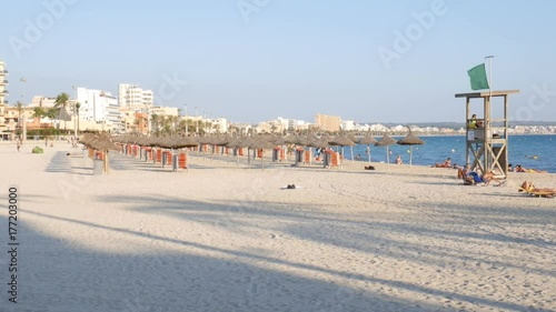 Can Pastilla Mallorca Spain: People on nearly empty beach in the evening