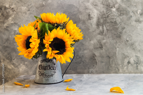 Fototapeta Naklejka Na Ścianę i Meble -  Yellow Sunflower Bouquet in Garden Jar
