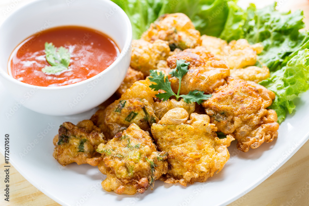 egg steam with fried and saucechilli, lettuce on table egg steam with fried and saucechilli, lettuce on table