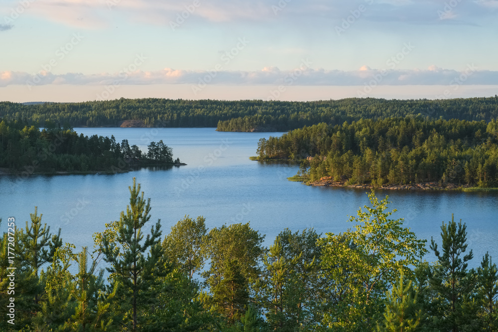 Summer evening landscape from the high shore of Ladoga lake in the skerries to the bay of Lehmalahti and the islands Summer evening landscape from the high shore of Ladoga lake in the skerries to the bay of Lehmalahti and the islands