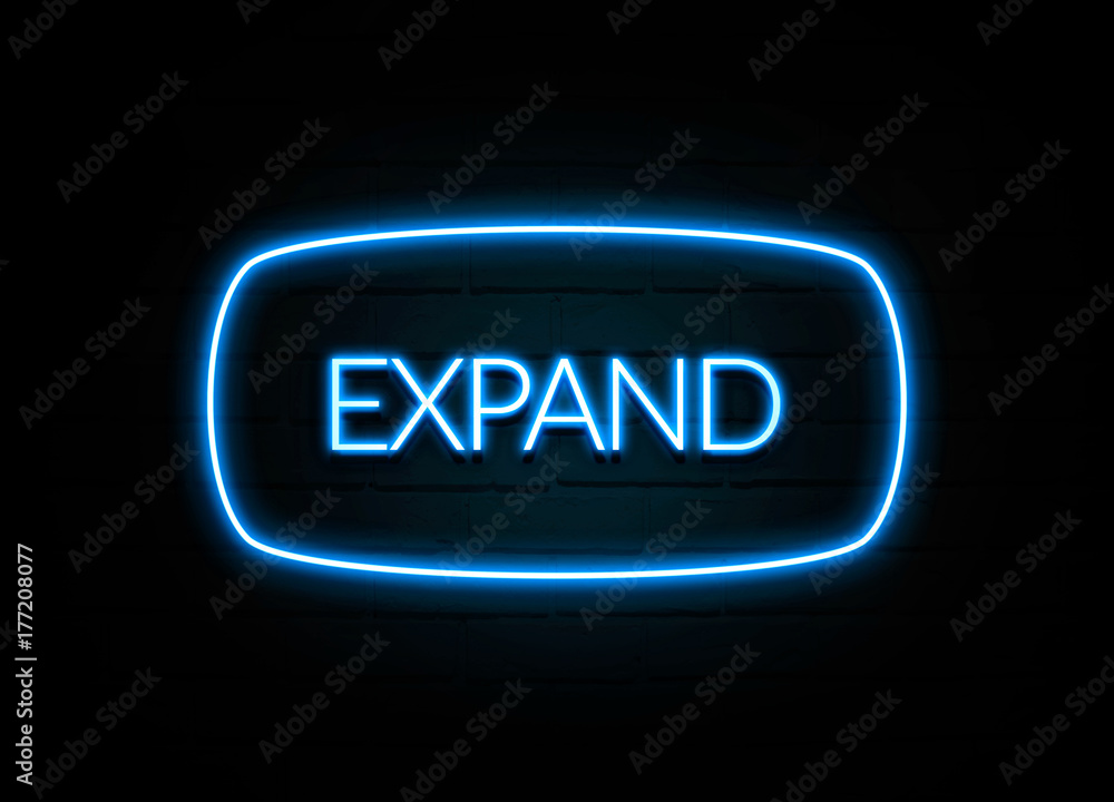 Expand - colorful Neon Sign on brickwall Expand - colorful Neon Sign on brickwall