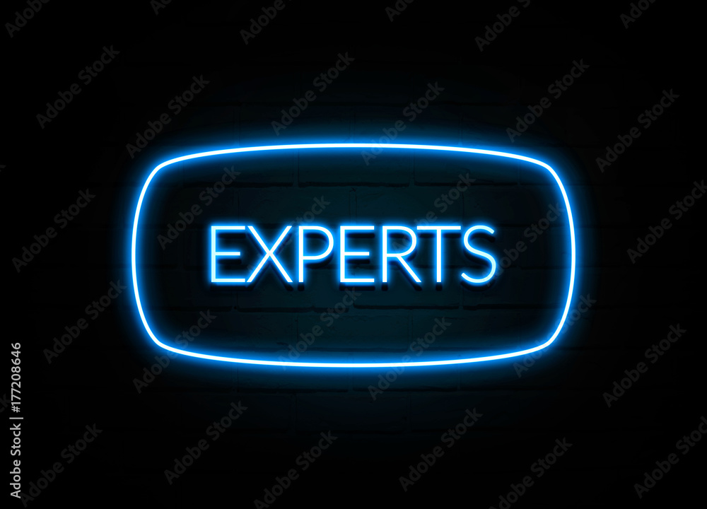 Experts - colorful Neon Sign on brickwall Experts - colorful Neon Sign on brickwall