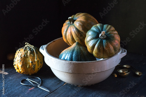 bowl of acorn squash in rustic setting photo