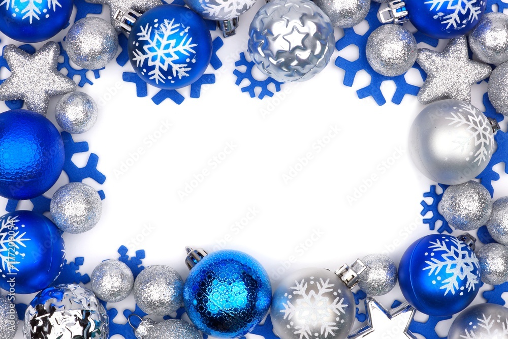 Christmas frame of blue and silver ornaments isolated on a white background Christmas frame of blue and silver ornaments isolated on a white background